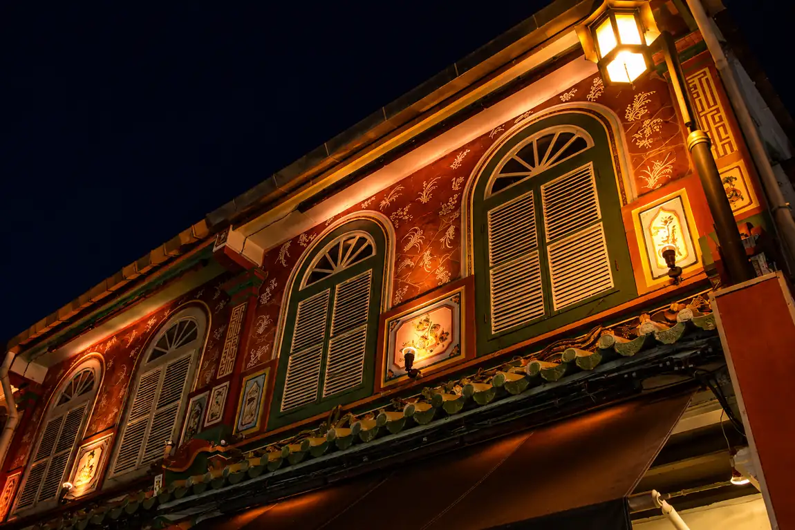 Jonker Street Melaka at dusk with red Chinese lanterns and heritage shophouses lining the street