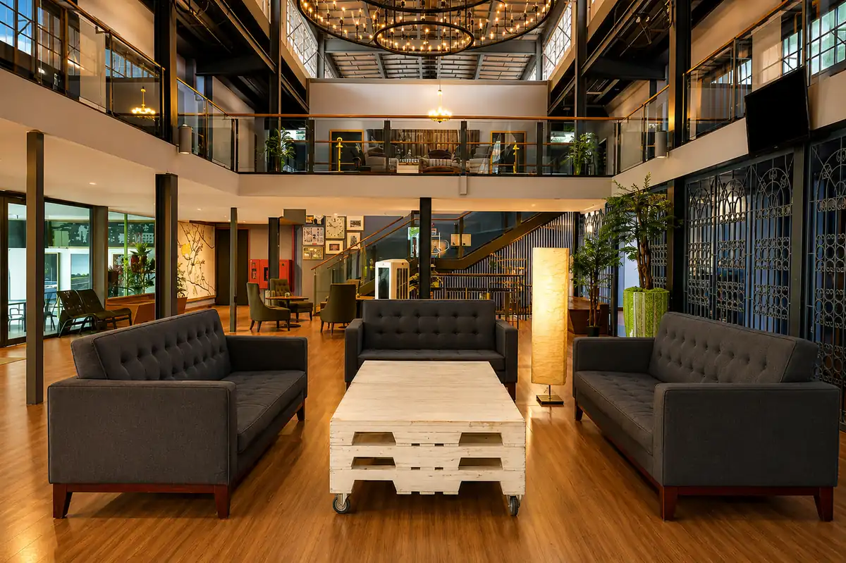 Lobby lounge at Quayside Hotel Melaka with double-height interiors and seating areas